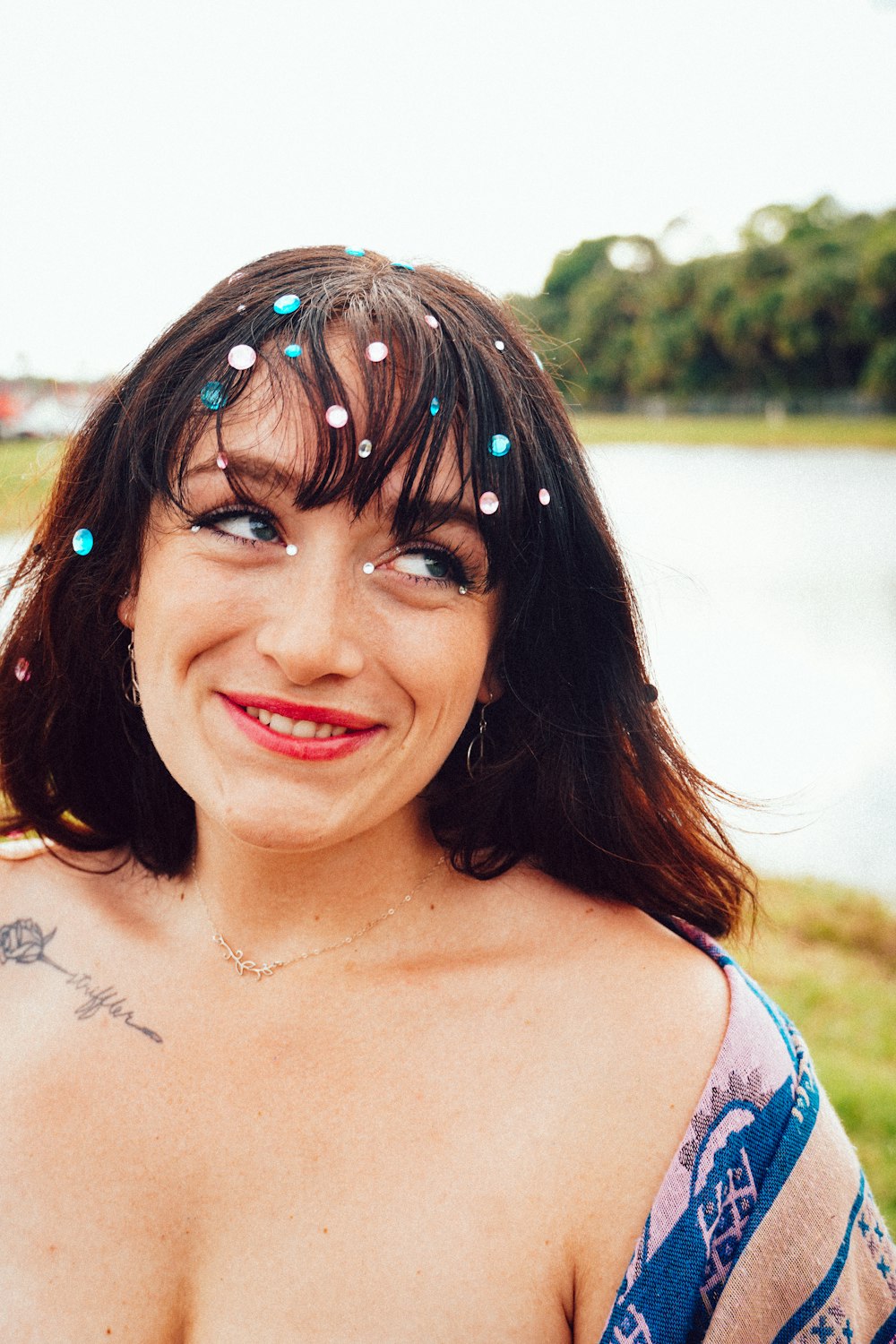 a woman with a tattoo on her arm