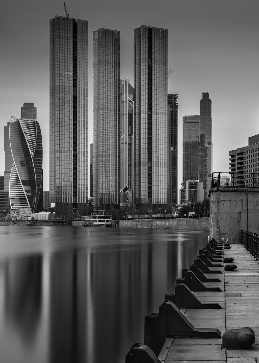 a city skyline with tall buildings