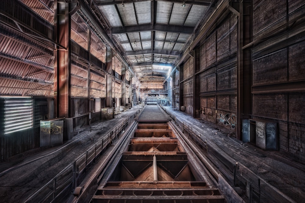 a long wooden staircase in a building