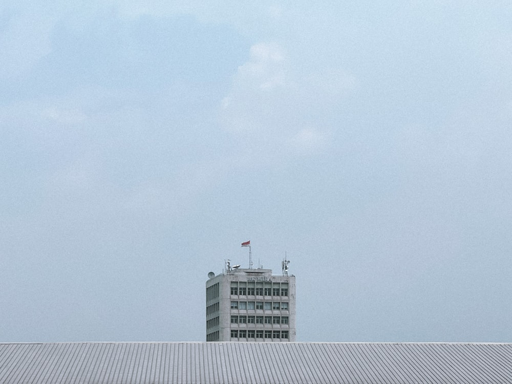 a building with a flag on top
