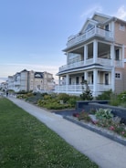 A peaceful urban neighborhood with modest, well-kept homes symbolizing ethical housing