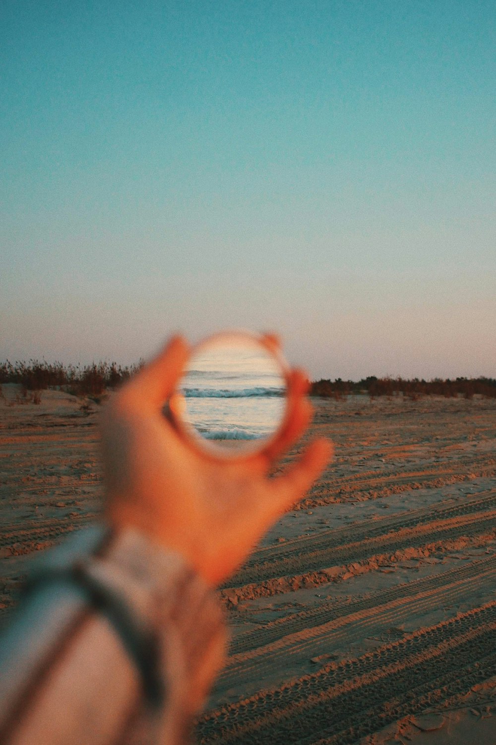 a hand holding a peace sign