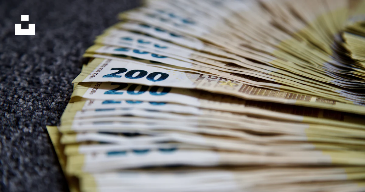 Paper Money Stack A stack of paper money photo – Free Grey Image on Unsplash