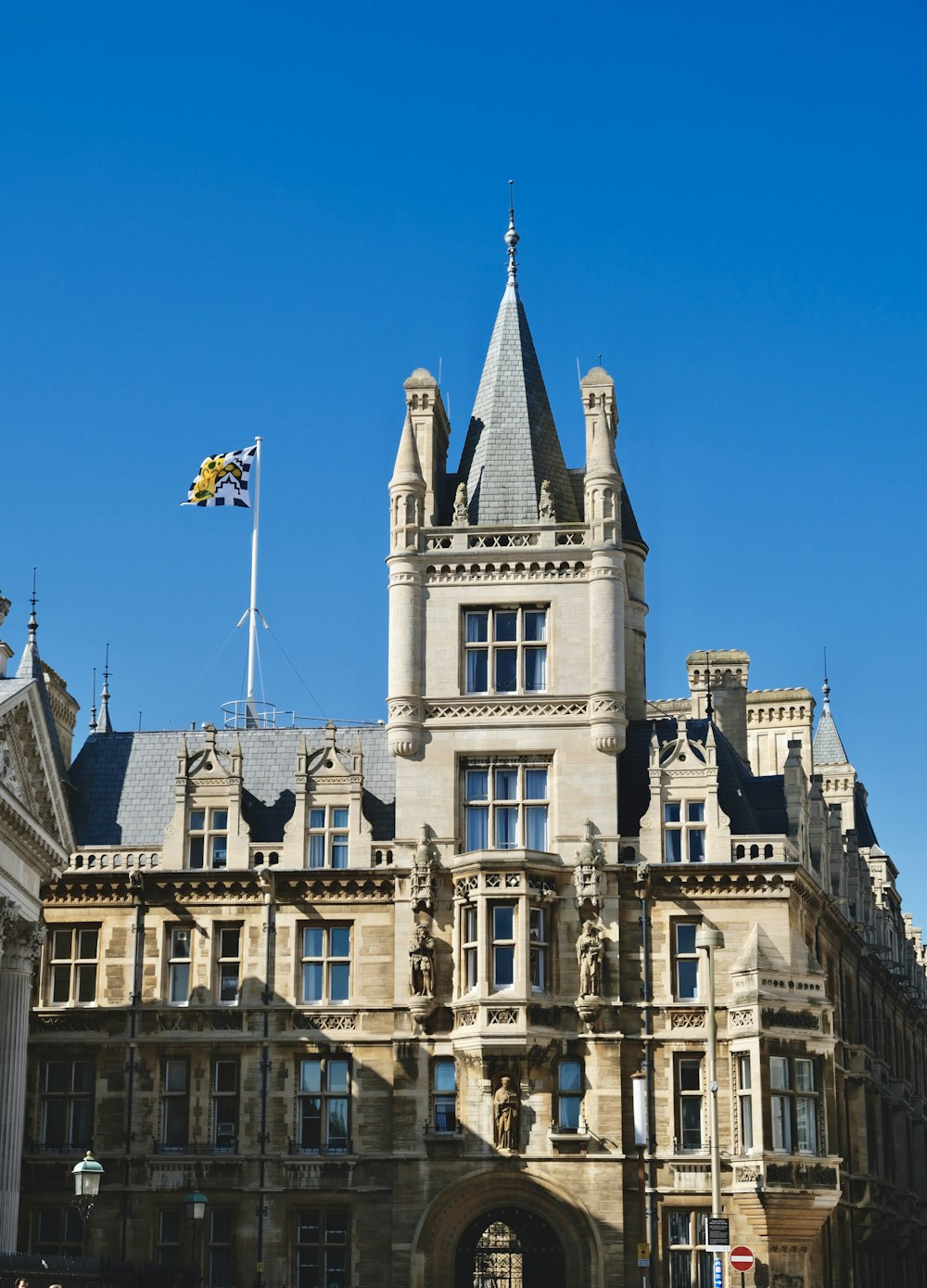 a large building with a flag on top