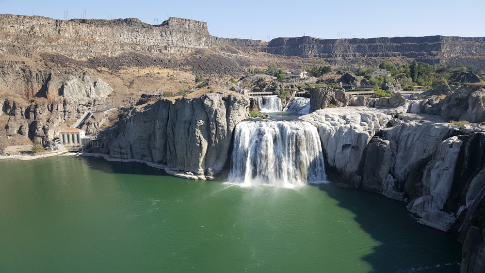 a waterfall over a cliff