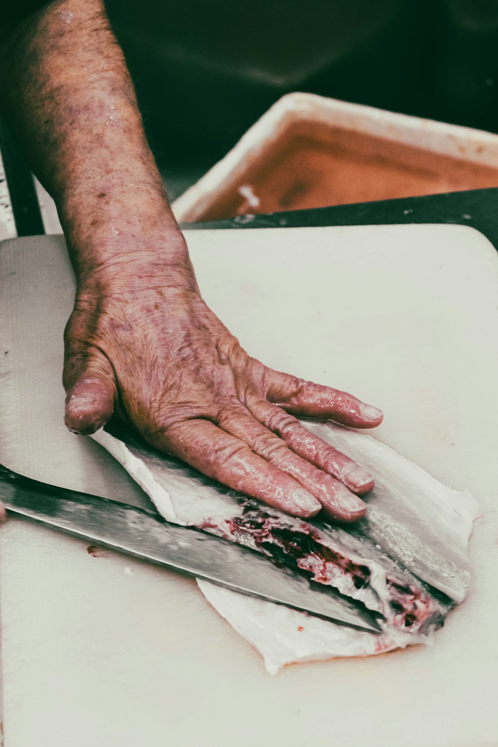 a person's foot on a piece of paper