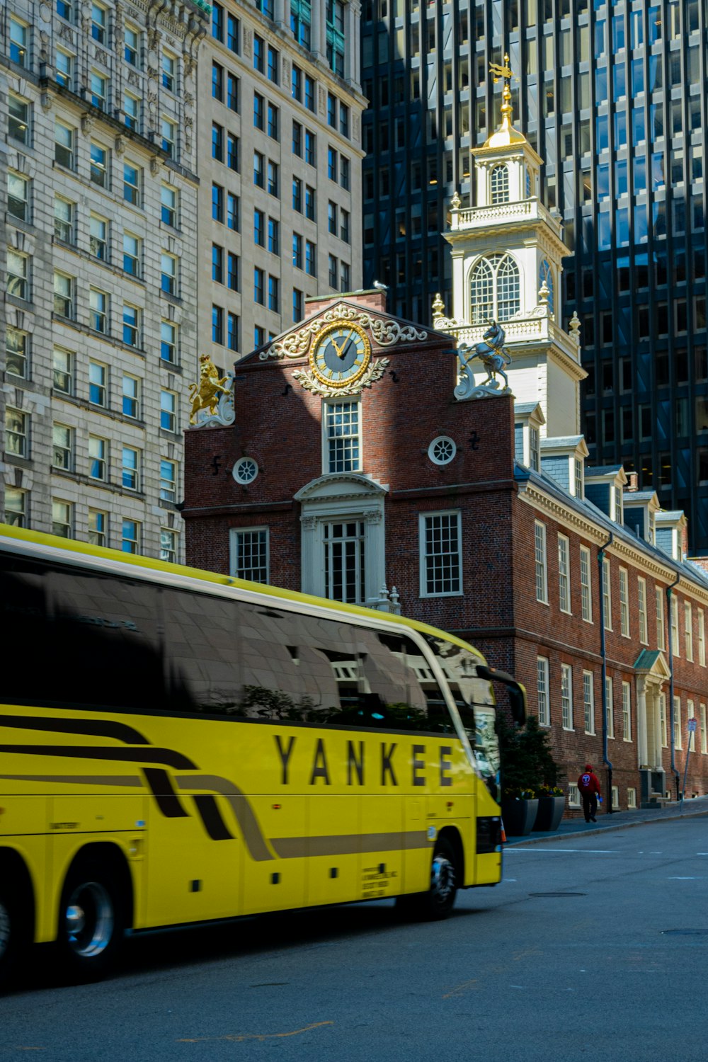 a yellow bus on the street