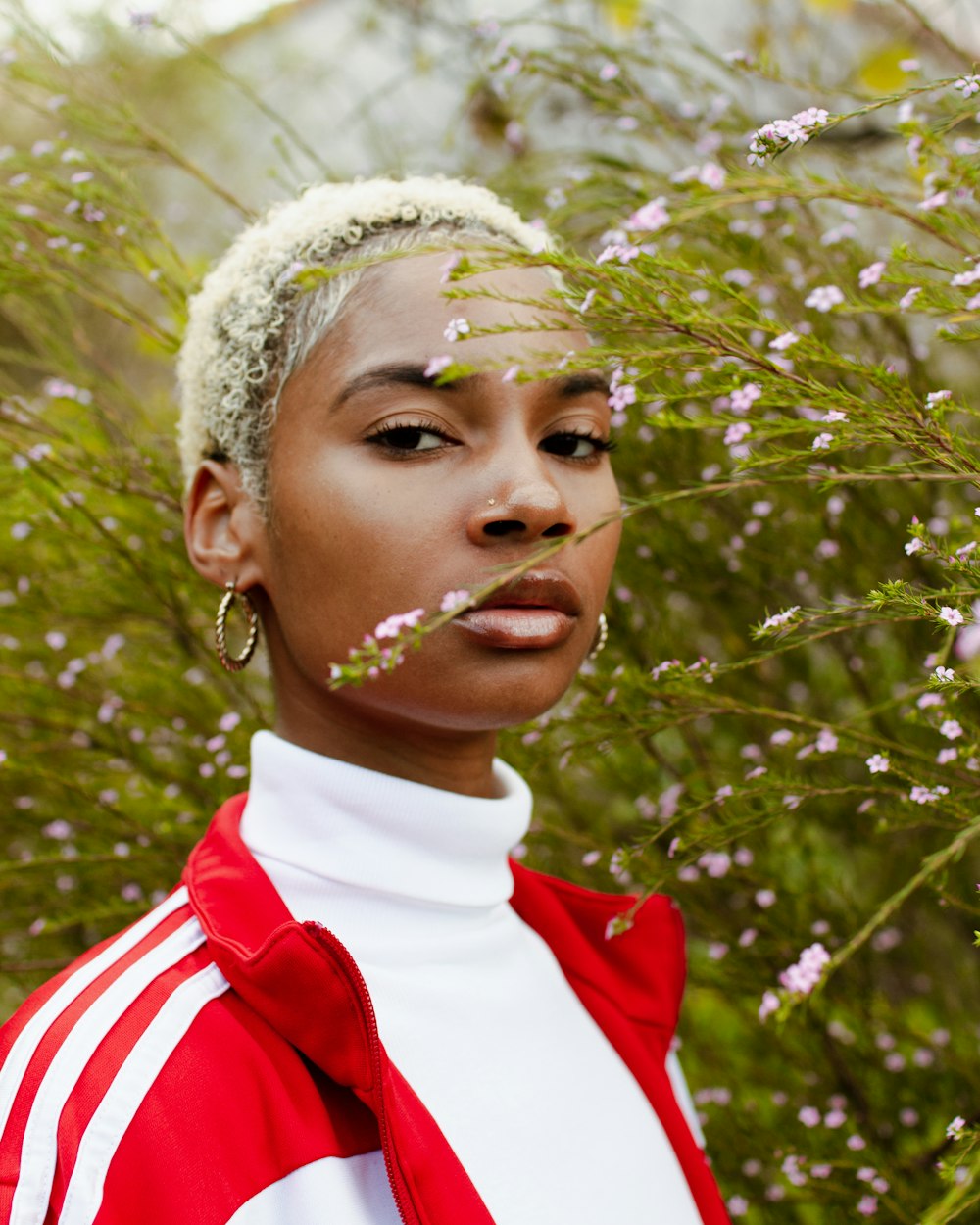 a person with a flower in the hair