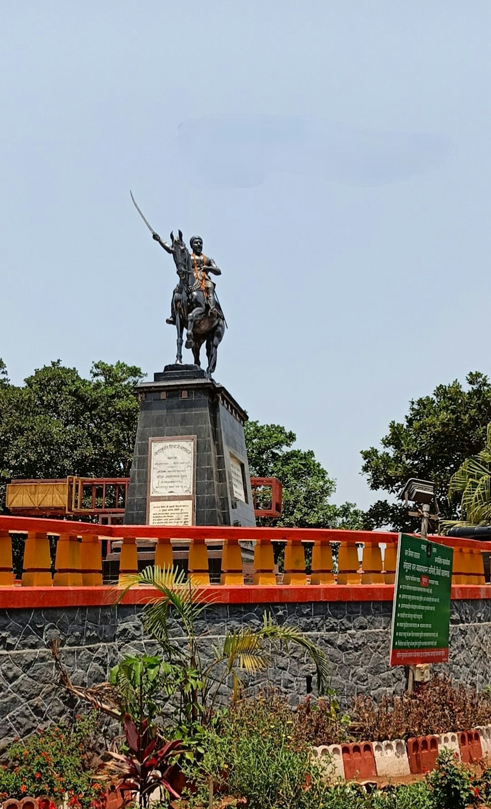 a statue of a person on a horse