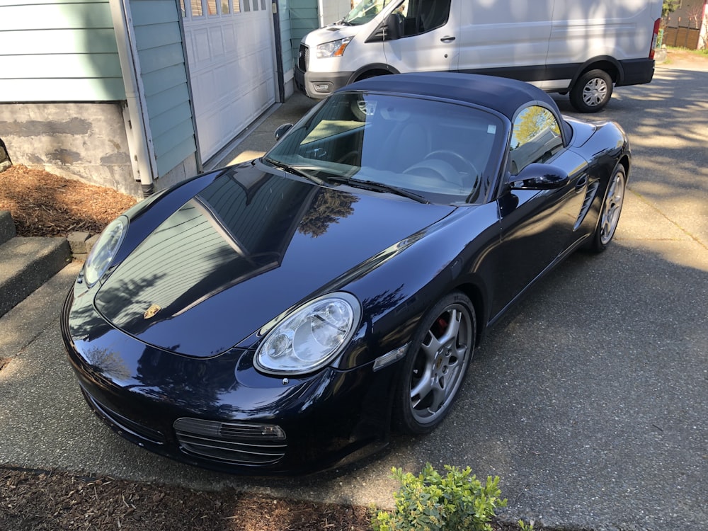 a black car parked on a street