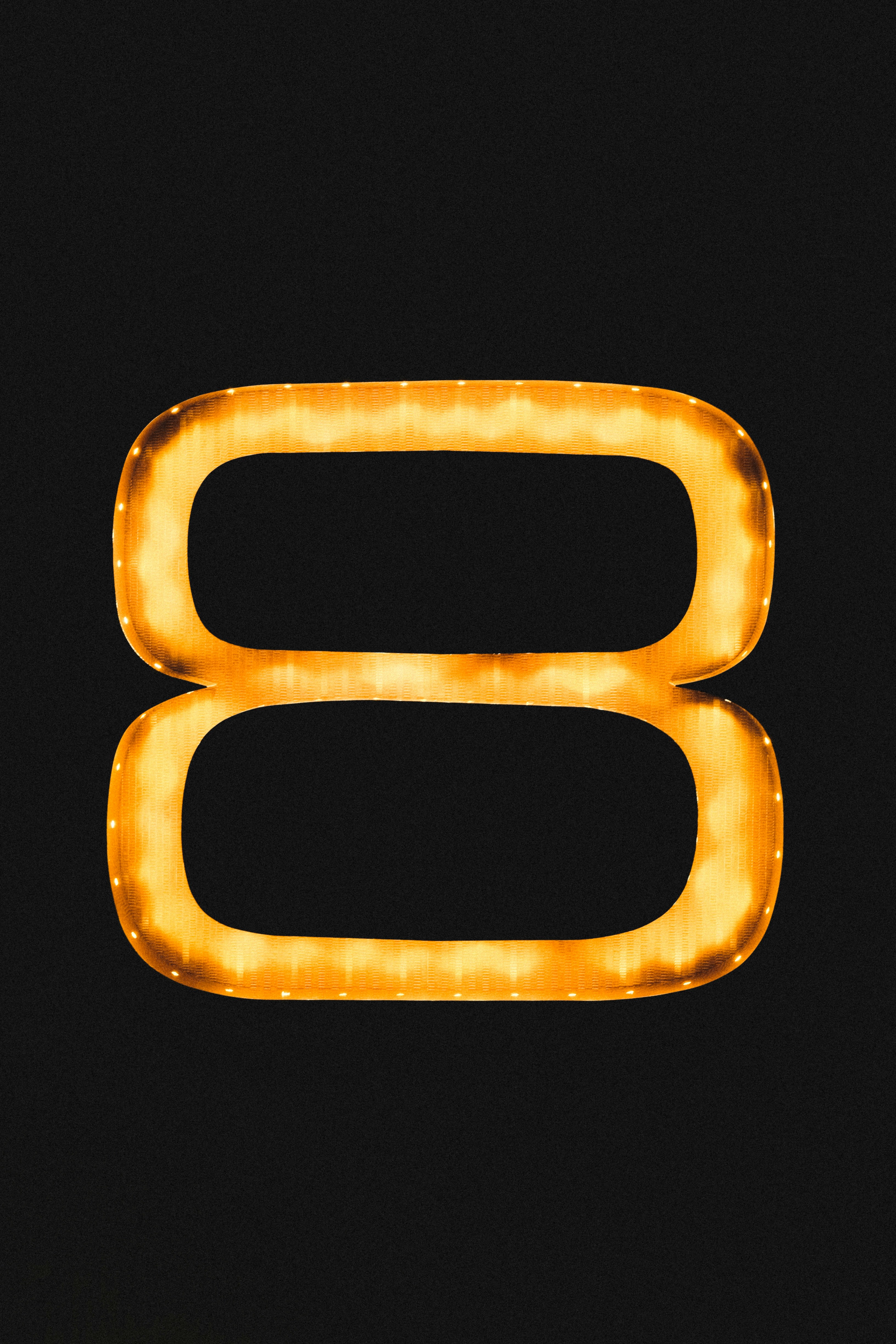 a gold ring with a black background