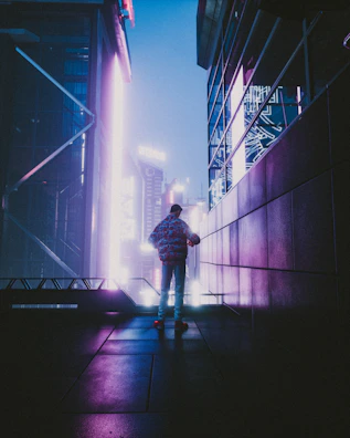 A nighttime cityscape with a figure in glowing urbanpulse jacket standing on a rooftop.