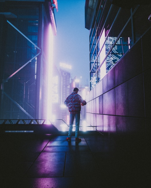A player navigating through a cyberpunk-themed urban landscape.