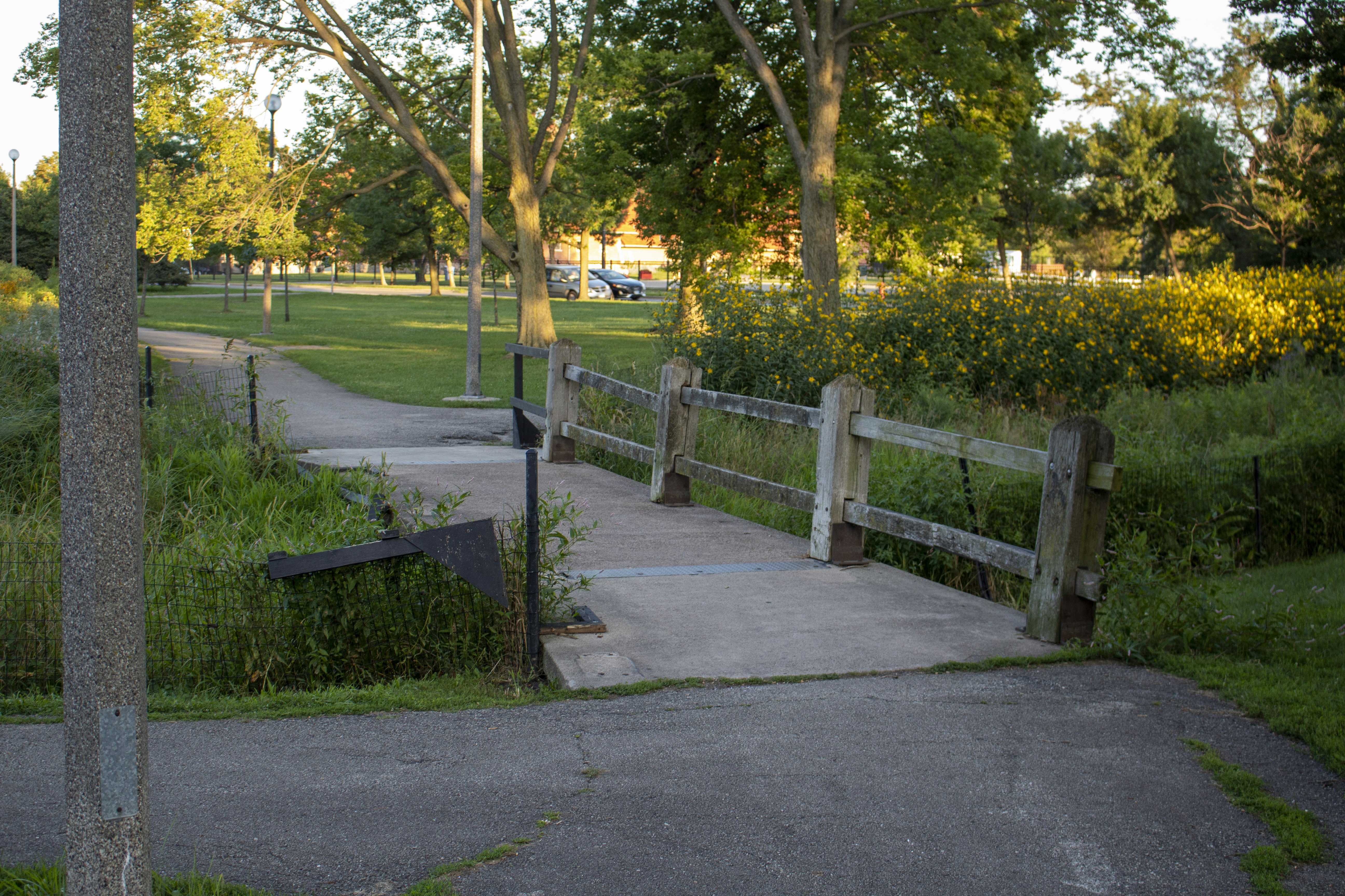 a wooden fence in a park
