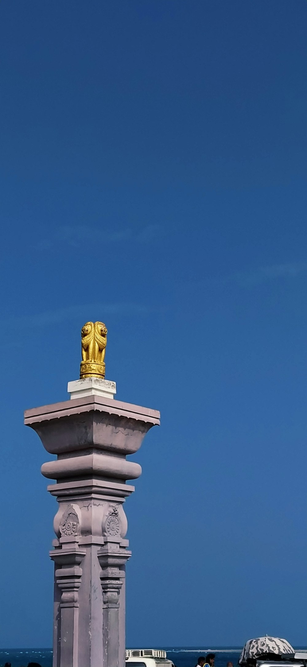 a statue on a pillar