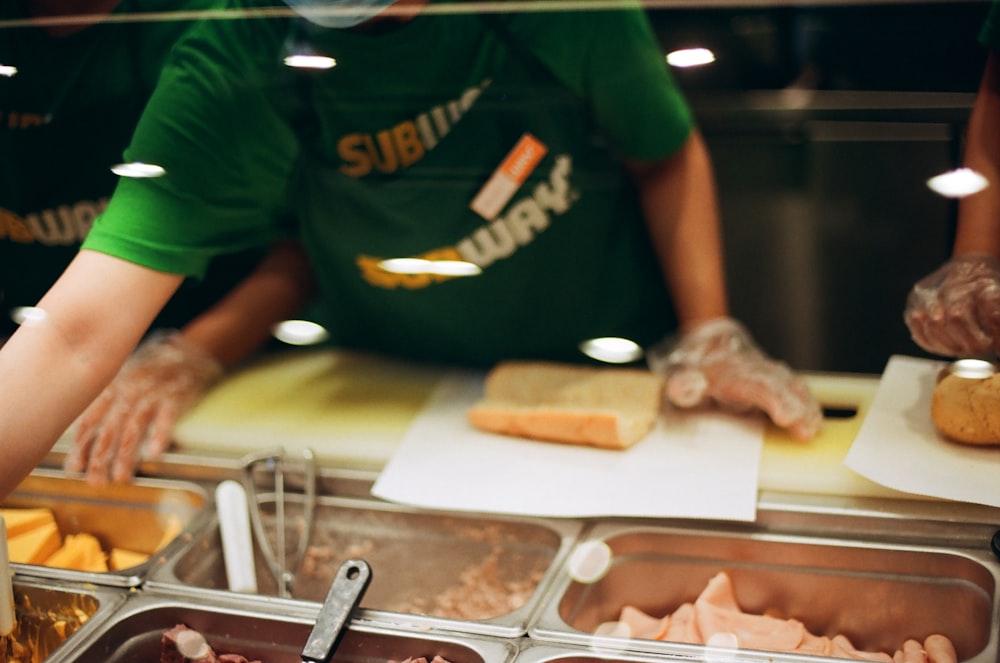 a person making a sandwich