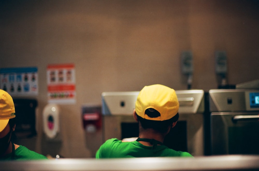 a group of people wearing hard hats