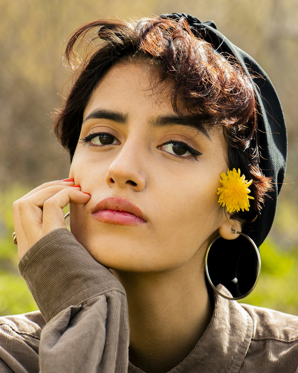 a person with a flower in the hair