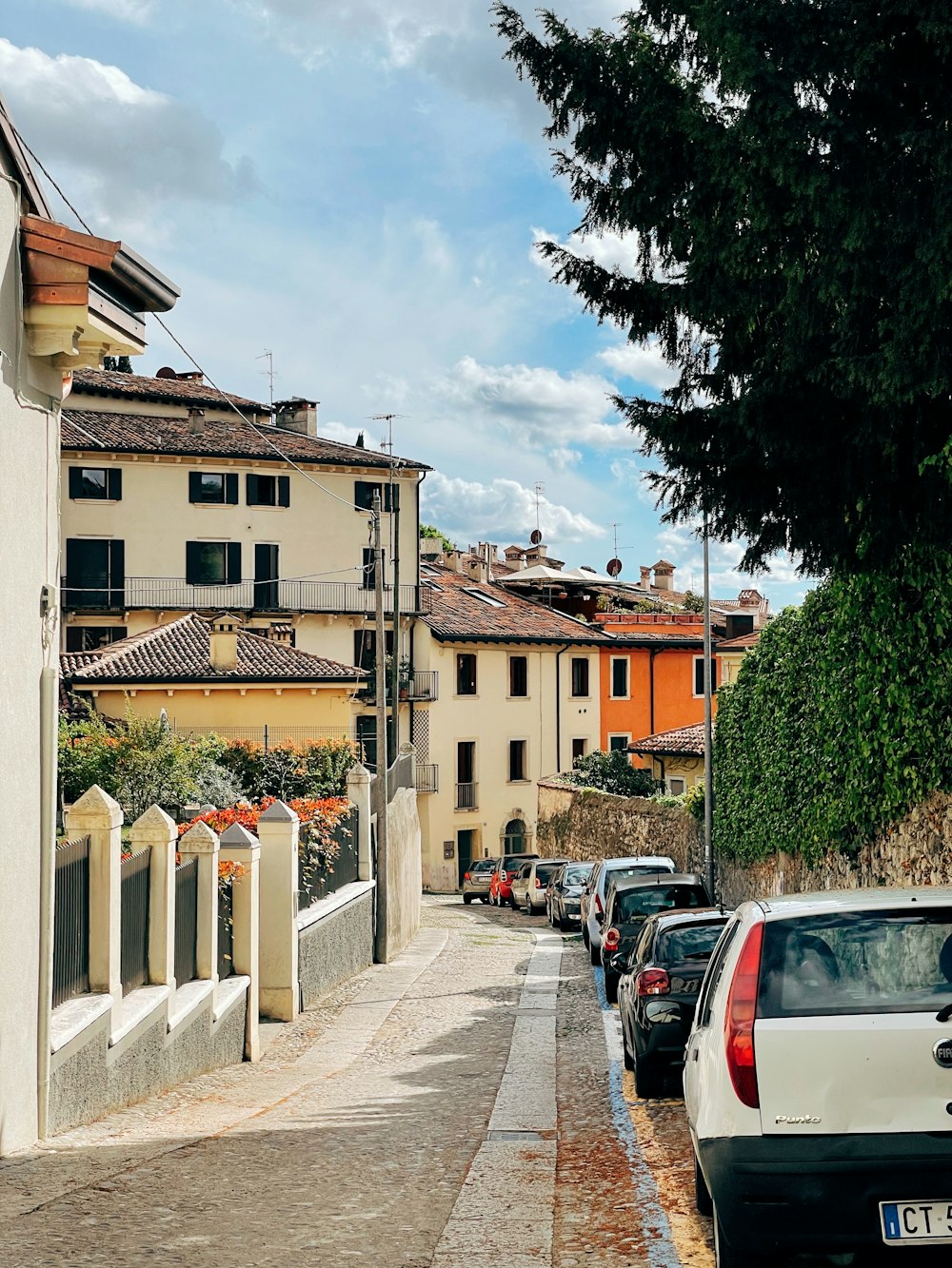 a street with cars parked along it