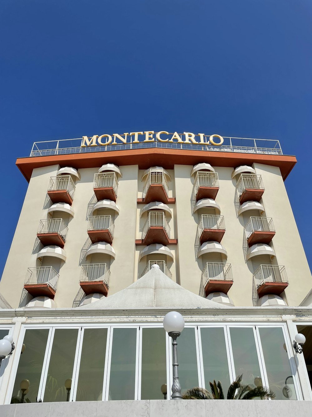 a building with balconies and a sign on it