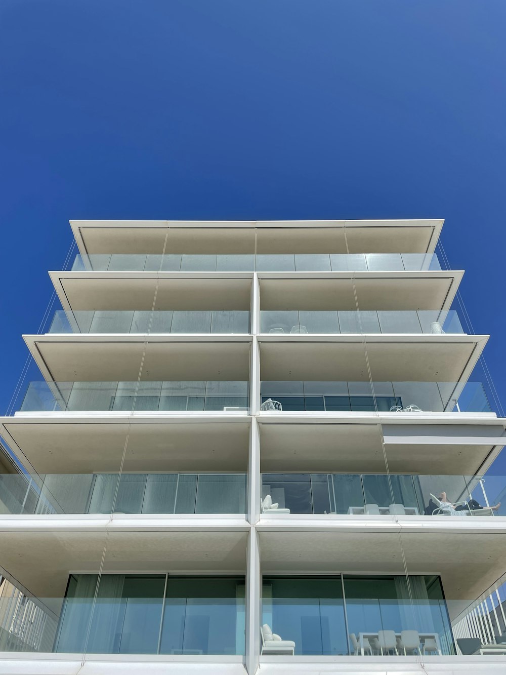 a building with windows and a blue sky