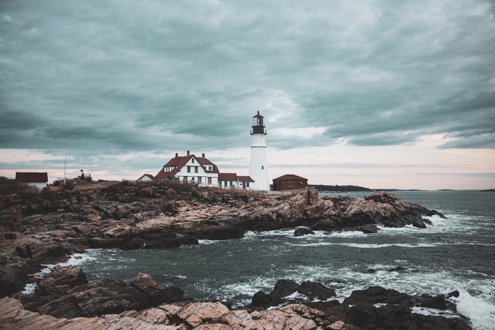 a lighthouse on a rocky shore