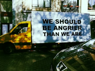 a yellow van on a street