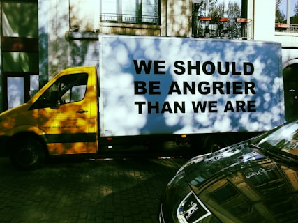 a yellow van on a street