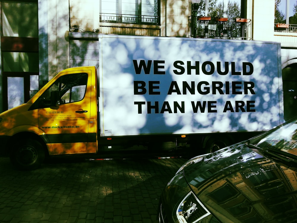 a yellow van on a street