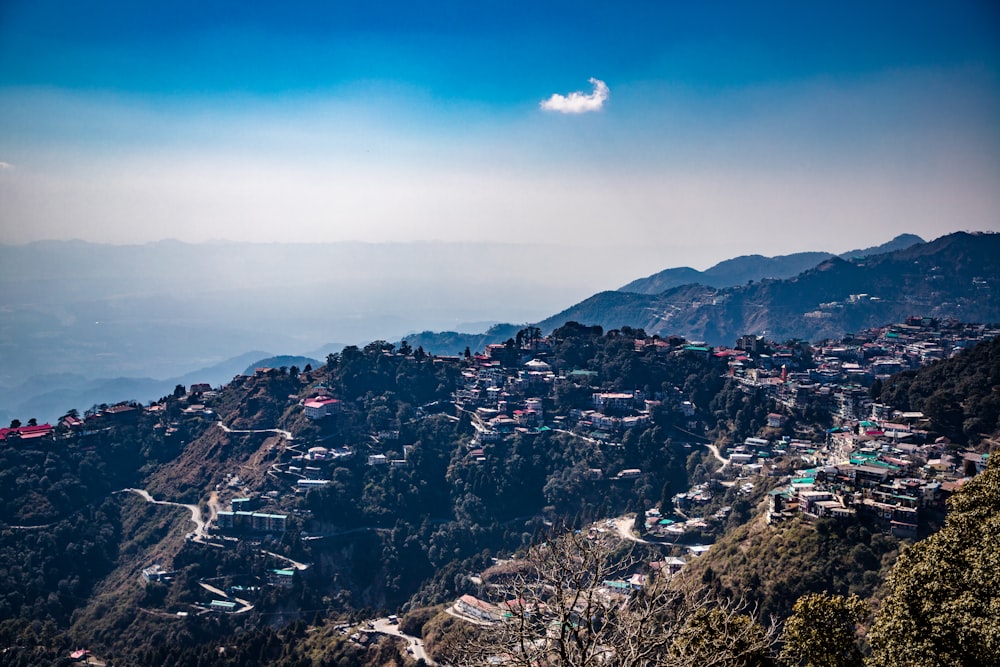 a city with mountains in the background