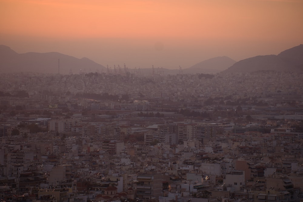 a city with mountains in the background