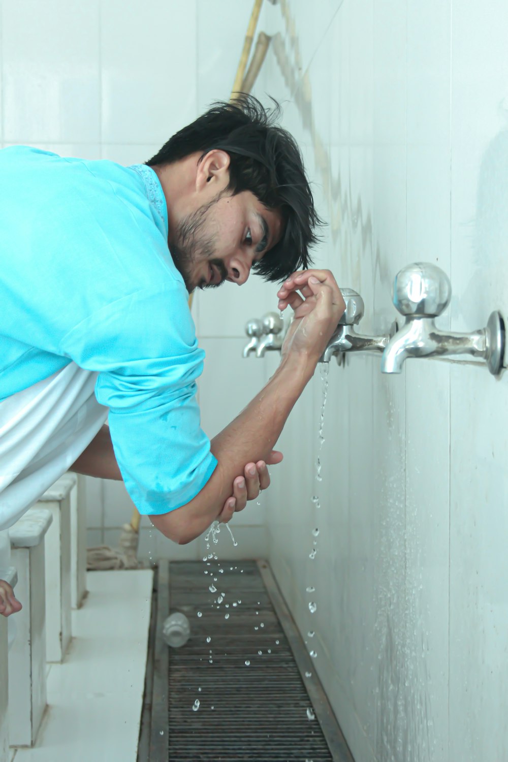 a man in a blue shirt