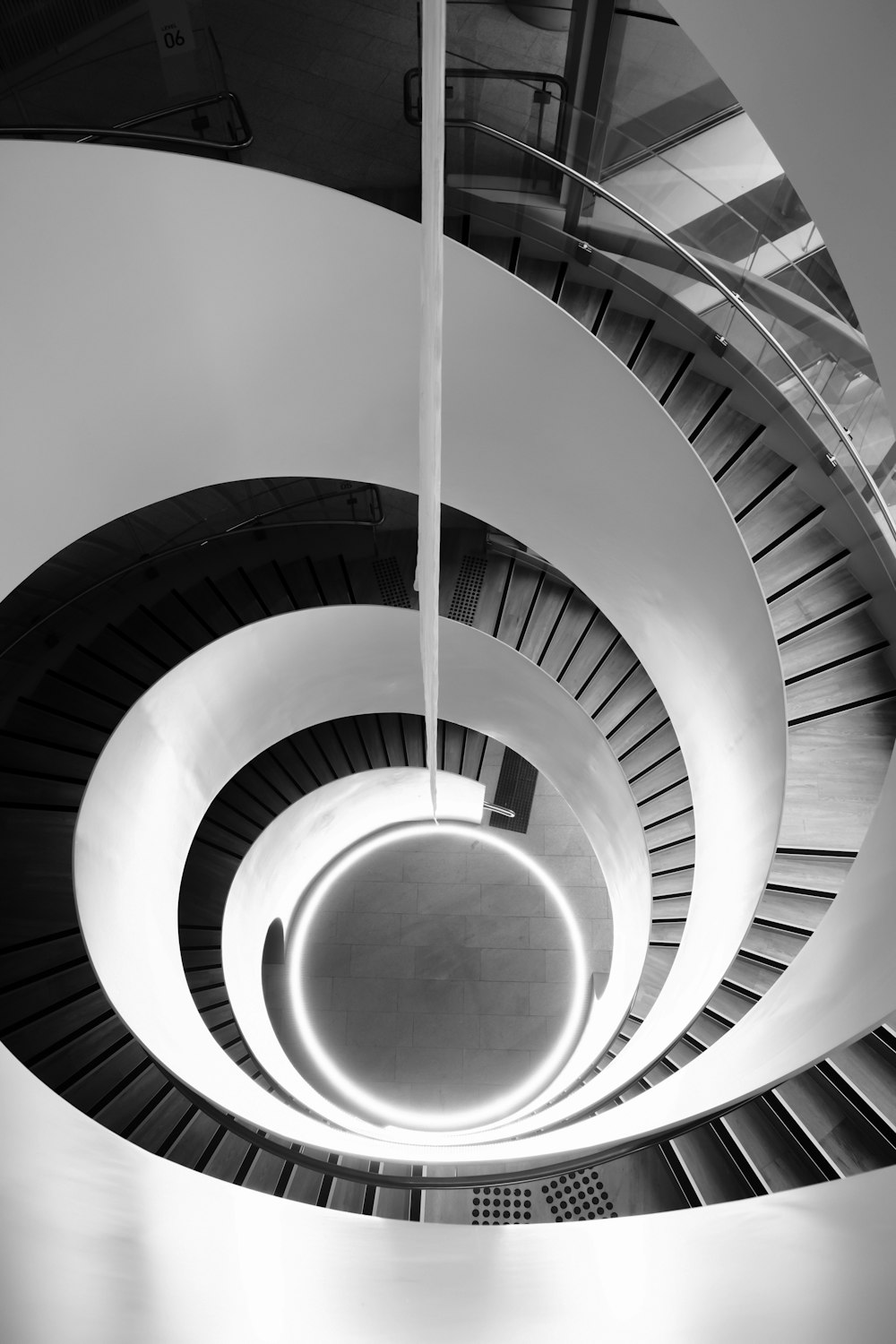 a spiral staircase with a light