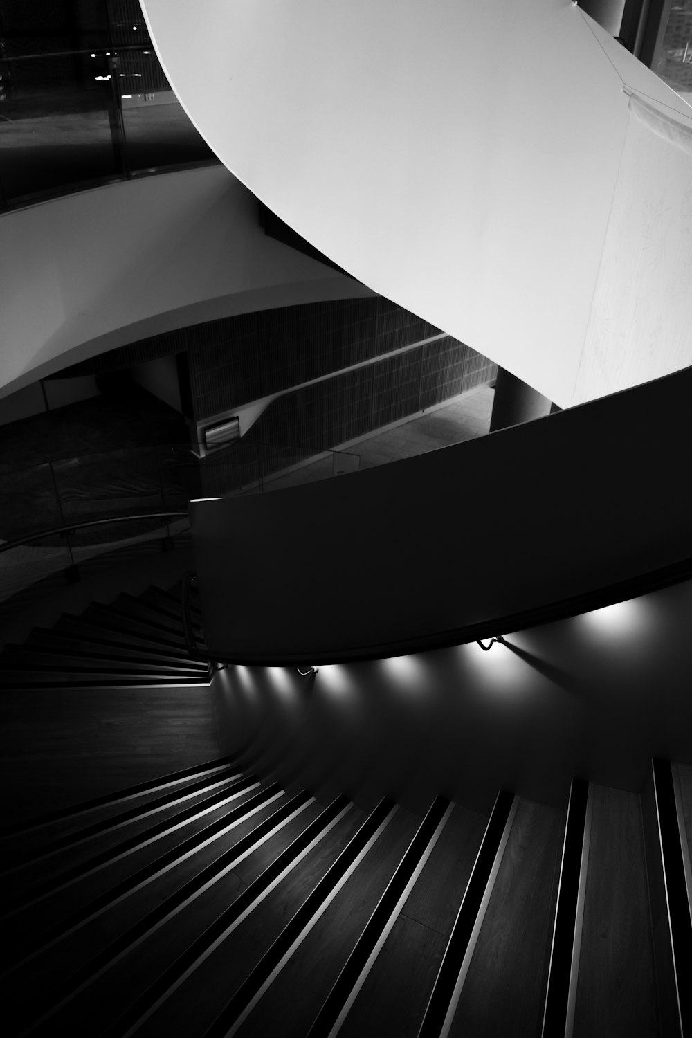 a staircase with a white railing