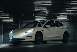 a white car parked in a garage