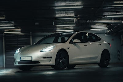 a white car parked in a garage