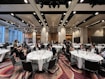 a group of people sitting at tables