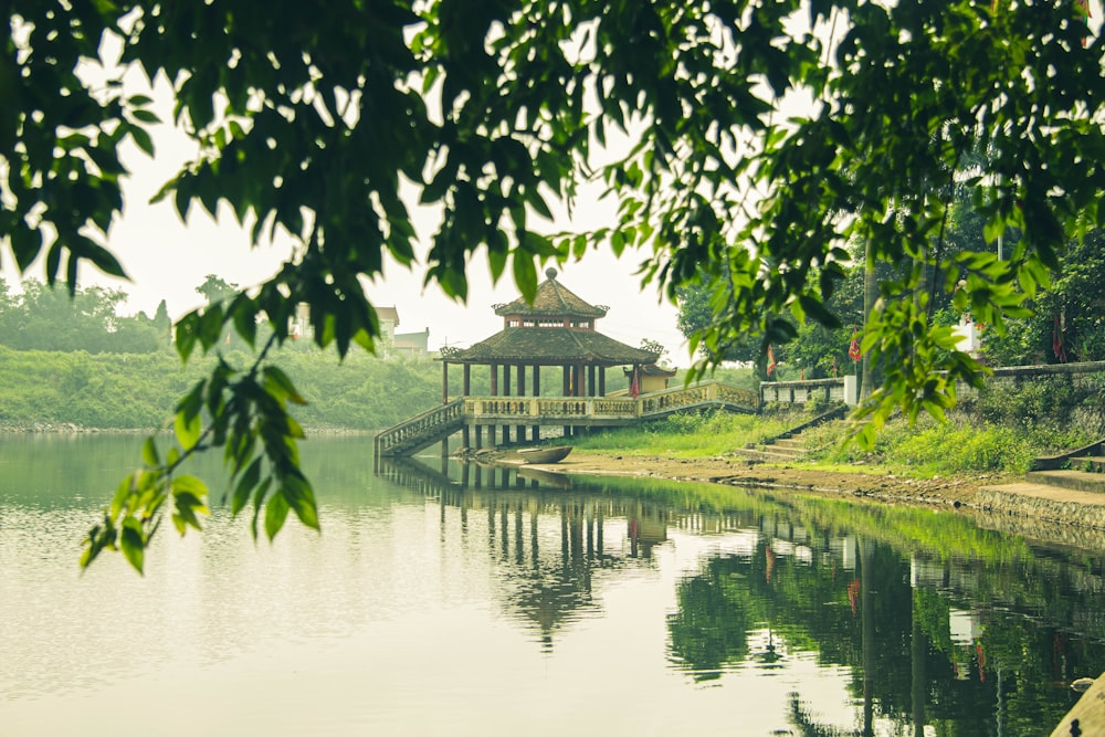 a pagoda building on a lake