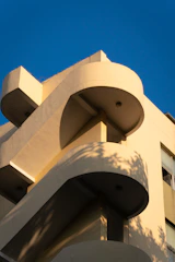 Close-up of a villa’s rounded corners and soft shadow details