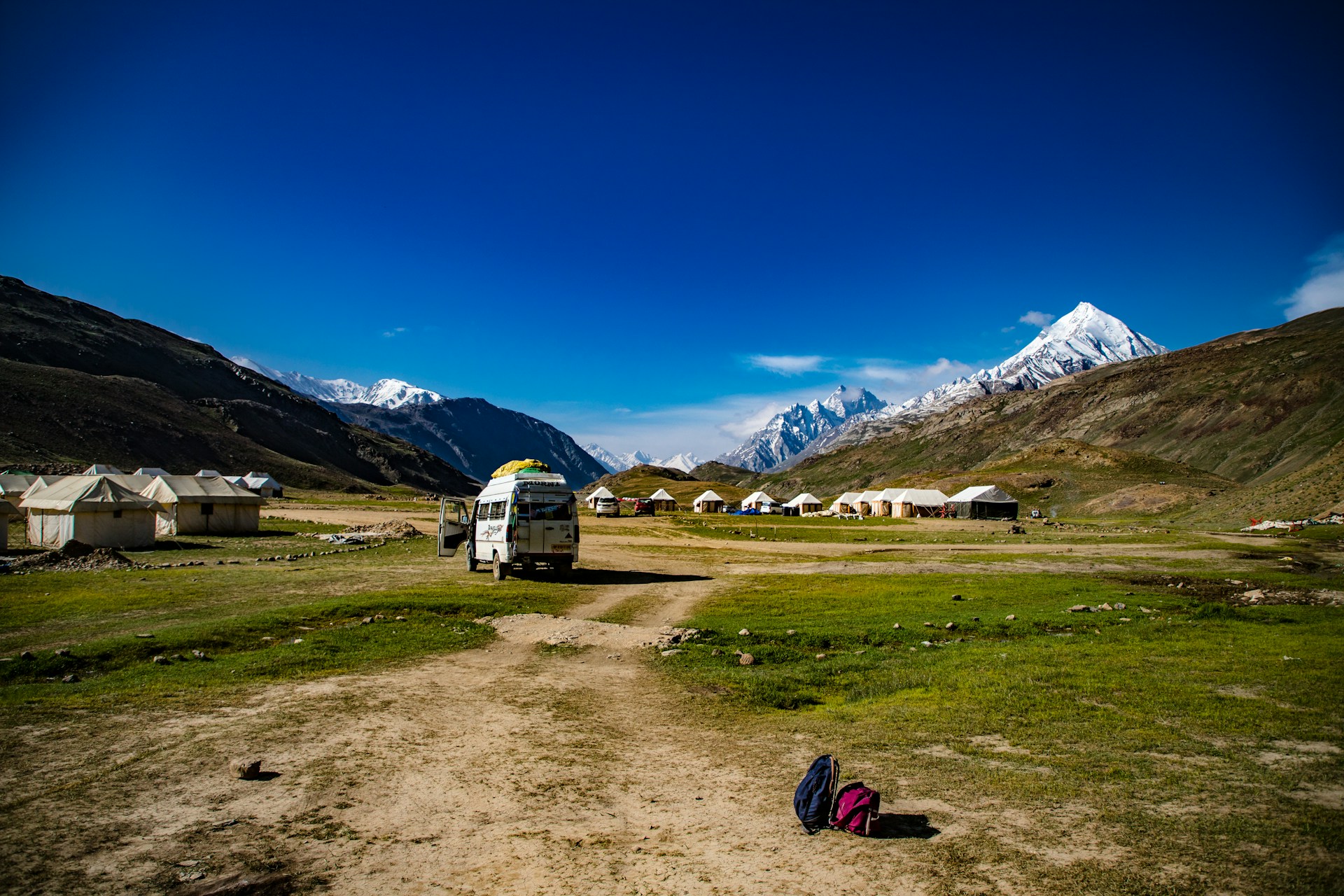 a group of tents in a field