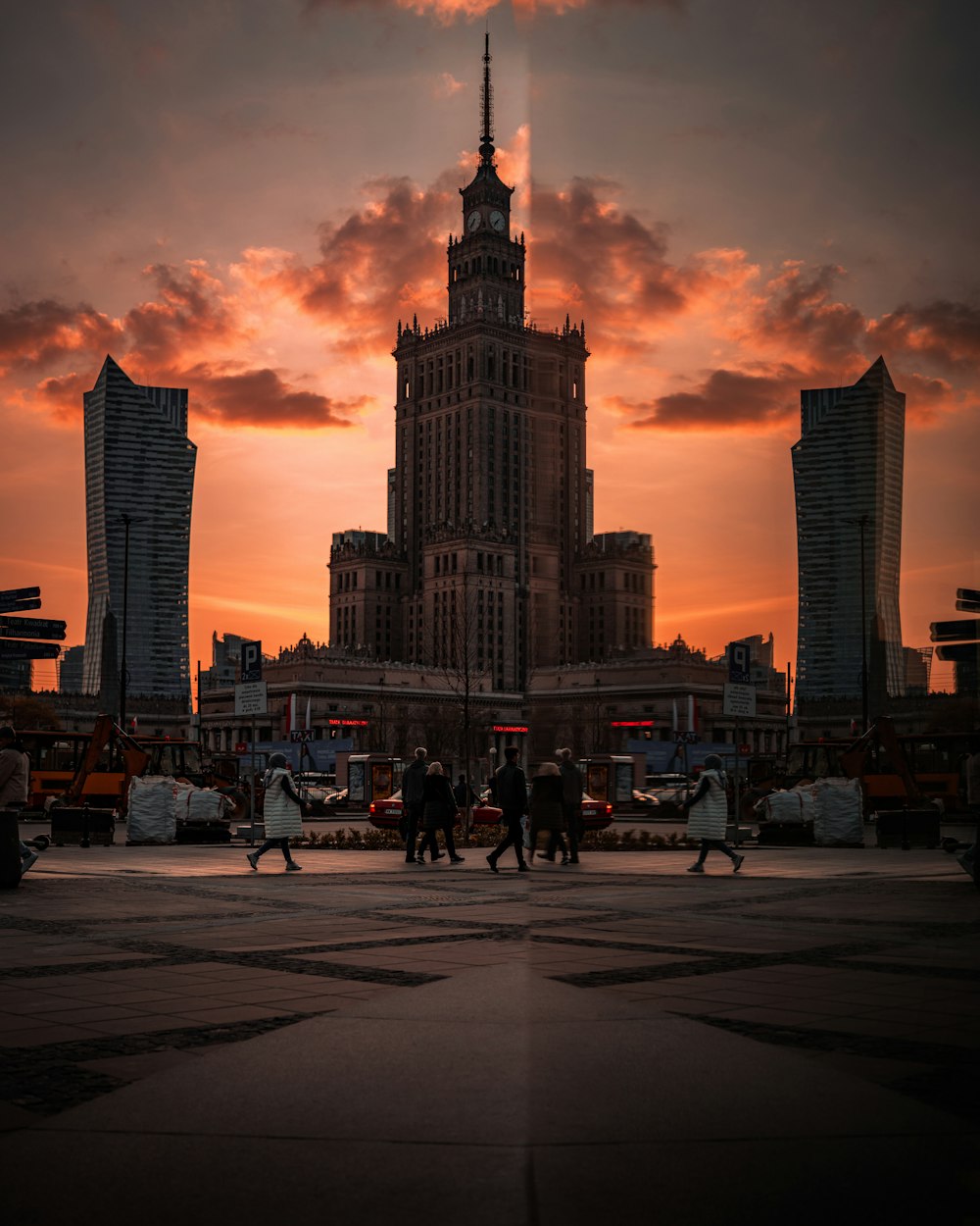 a group of people walking in a city