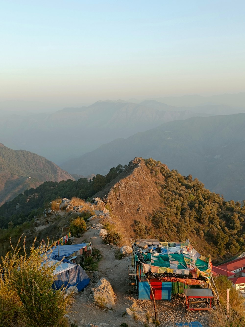 a group of tents on a hill