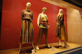 a group of mannequins in a room