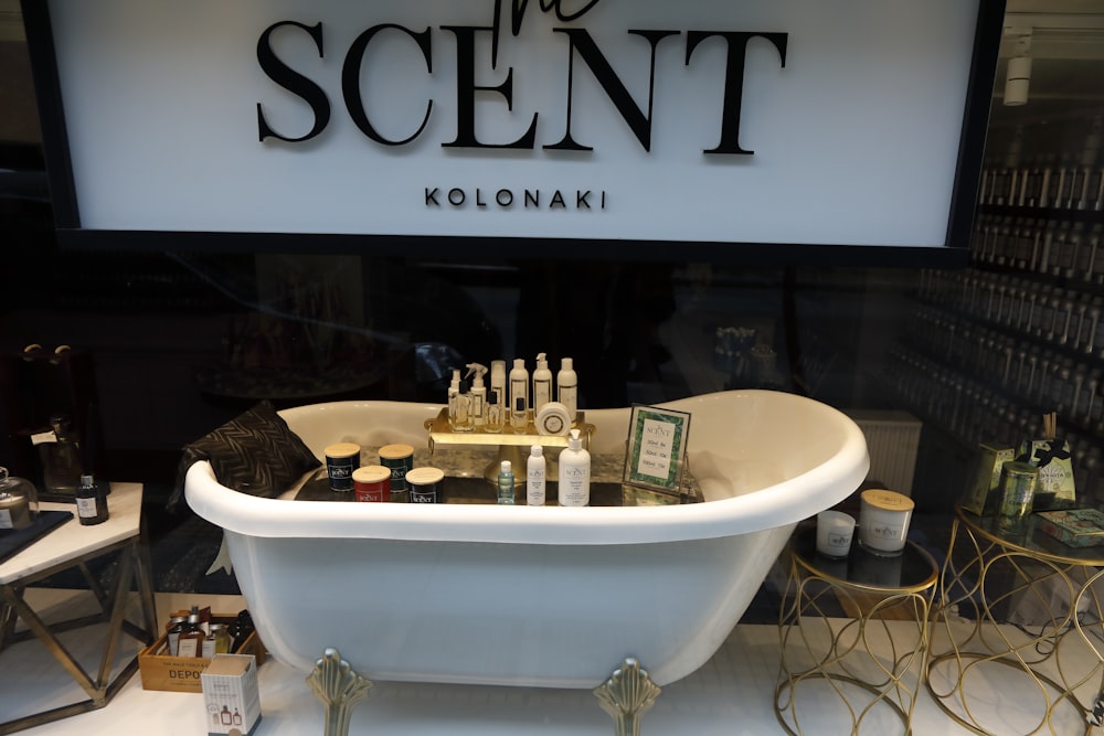 a large white tub with a white tub and a sign above it