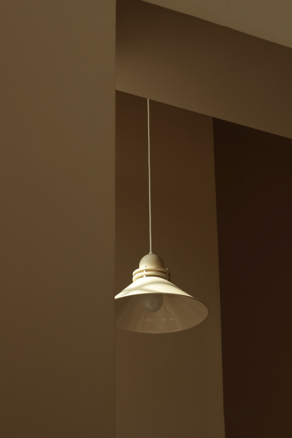 a light fixture from a ceiling