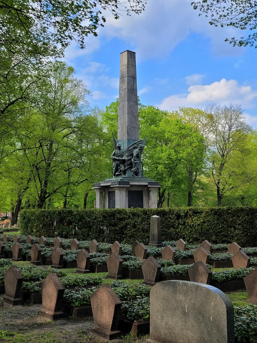 a statue in a cemetery