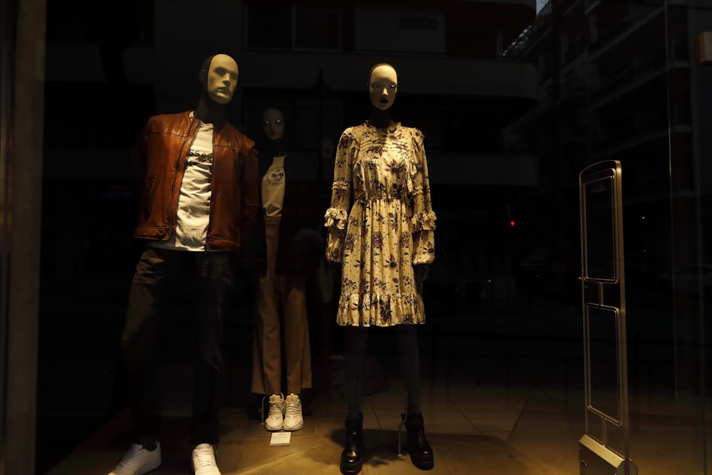 a group of mannequins in a room