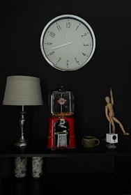 A cozy urban apartment corner featuring a grabbasket clock as the centerpiece on the wall.