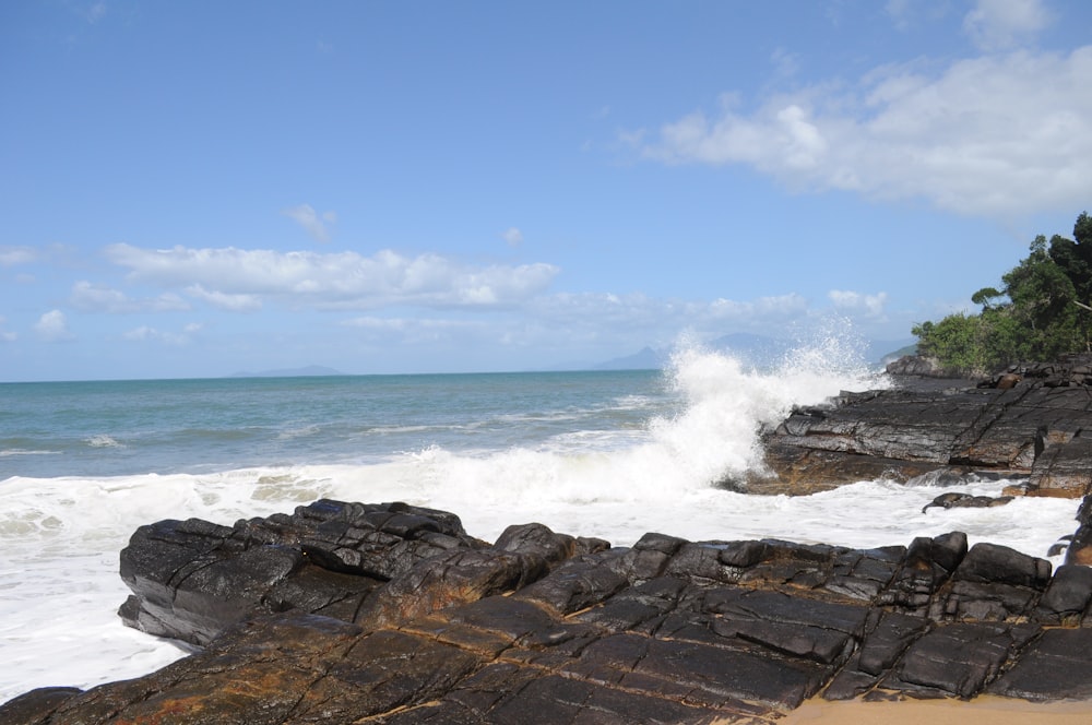 waves crashing on rocks