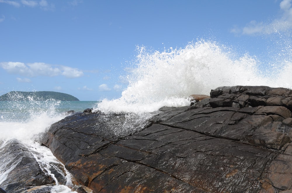 waves crashing on rocks